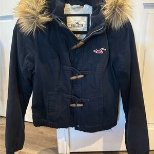 Hollister Women's Navy Sherpa lined Jacket with Faux Fur Hood and toggle buttons